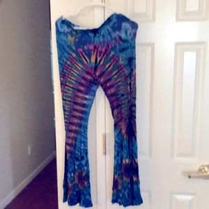 Tuscan Tango tie dyed flare bottom spandex leggings. Each pair made are unique.